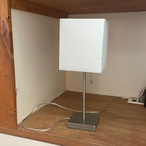 Silver and white lamp.